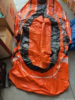 Full view of deflated Kondor 200 raft showing overall condition