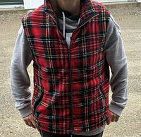 Front view of Wrightway red plaid fleece vest worn by model