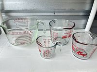 All four measuring cups grouped together