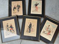 All five framed lithographs laid out