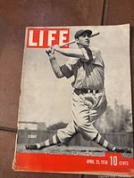 Cover featuring baseball player swinging bat, dated April 25 1938