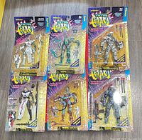 Group shot of six sealed Total Chaos figures showing all packages front view