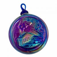 Front view showing cottage scene and iridescent finish