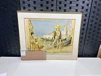 Full view of framed lithograph on display table