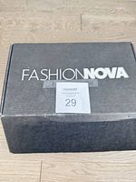 Fashion Nova branded shoe box closed