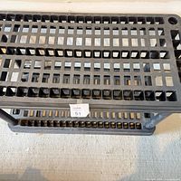 Top view showing ventilated grid surface of upper shelf