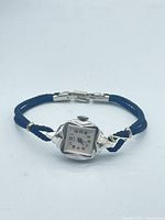Full view of Elgin ladies wristwatch showing case, dial, and braided strap
