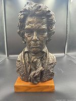Full frontal view of Beethoven bust on wood base