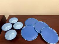 Full set showing four bowls and four plates