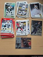 Stacks and spread of Rob Blake hockey cards showing front designs