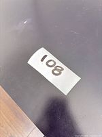 Top surface showing black finish and wear