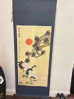 Full view of hanging scroll with cranes, pine and red sun