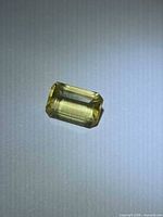Rectangular golden yellow scapolite gemstone front view