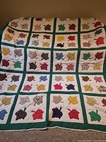 Full view of quilt showing overall design and dimensions reference