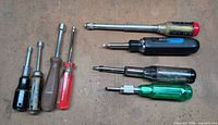 All eight drivers laid out showing types and condition