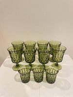 Group of all 11 olive green goblets and tumblers