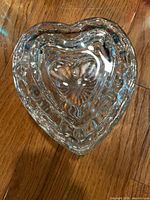 Top view showing nested heart-shaped pressed glass dishes