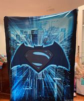 Full view of blanket showing graphic and size