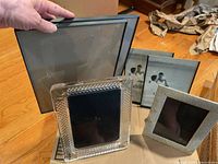 Group of five frames showing materials and sizes