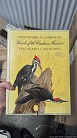 Front of book showing title, authors and bird illustration