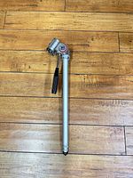 Monopod collapsed showing head, handle and logo badge
