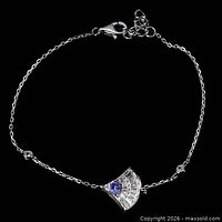 Full bracelet showing chain, clasp, fan centerpiece, extender