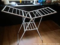 Drying rack fully opened showing V-wing arms