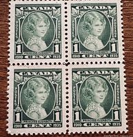Front view of full block of four stamps