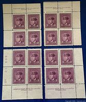 Front view of four 3¢ King George VI corner plate blocks