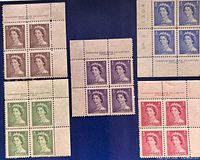 All five plate blocks arranged together showing colours and denominations