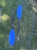 Both paddles side by side highlighting color and two-piece configuration