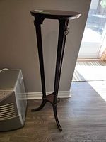 Full view of mahogany finish wood pedestal plant stand