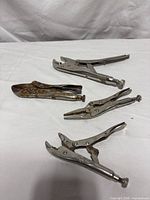 All four locking pliers laid out