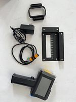 Printer, power adapter, sensor cable, bracket, handle loop
