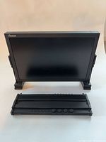 Front view of Ruige 24-inch monitor with control module placed in front