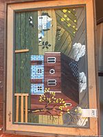 Full view of framed wood slat landscape artwork