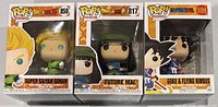 Front view of three boxed Funko Pop figures