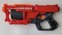 Left side view showing MEGA logo and overall color scheme