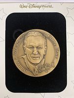 Medallion mounted on display card