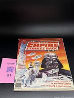 Front cover showing title, Darth Vader, Luke on tauntaun artwork