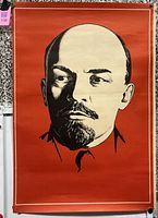 Full view of poster showing portrait and red background