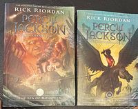 Front covers of both Rick Riordan Percy Jackson books