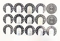 All 15 gauge faces laid out, showing mix of tachometer and speedometer faces