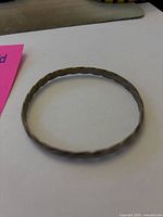 Full view of sterling silver twisted bangle bracelet