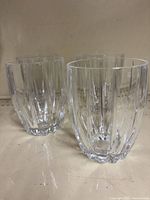 Four Marquis by Waterford crystal tumblers grouped together