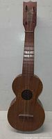 Full frontal view of Kumalae soprano ukulele showing overall length and body