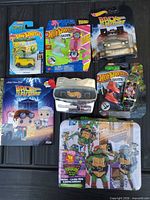 Overview of all seven packaged items on table