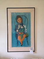 Full view of framed serigraph on wall