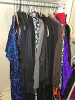 Rack of assorted women’s garments showing quantity, colors and types