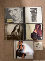 Front covers of all five CDs